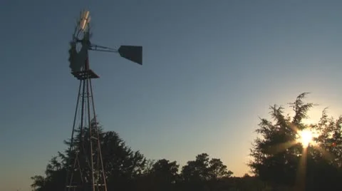 Windmill swivels with changing wind direction - seamless loop Stock Footage 8957929