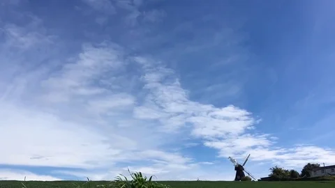 Windmill time-lapse with interesting sky movement Stock Footage 81299197