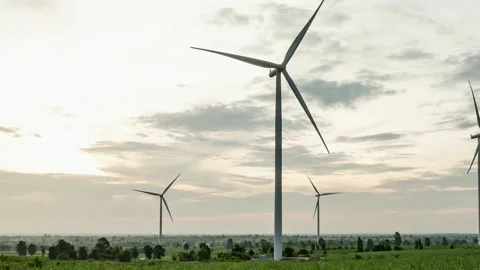 A windmill on top of a grass covered field 스톡 동영상 156845141