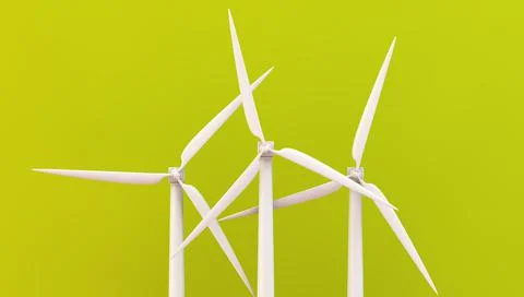 Windmill turbines on green background 3d rendering Illustrazione stock