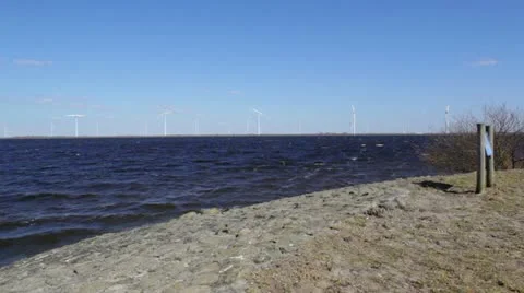 Windmill turbines with shore Stock Footage 22372180