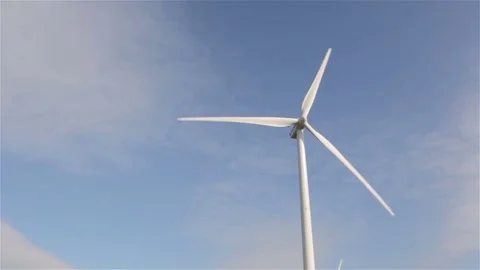 Windmill turning with blue sky in the background Stock Footage 83165421