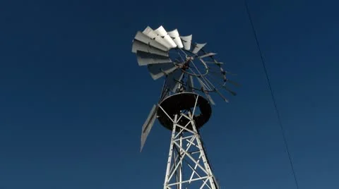 Windmill turning low angle wide Stock Footage 8836974