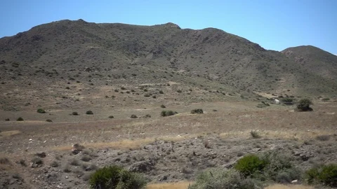 Windmill under blue sky in Almeria, Andalucia Stock Footage 90782524