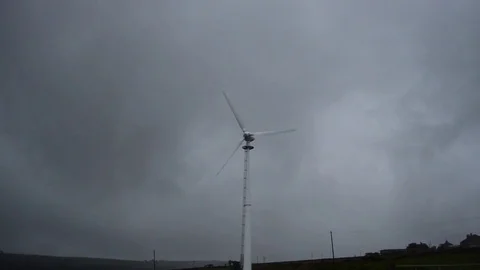 Windmill on a very cloudy day in west Yorkshire Stock Footage