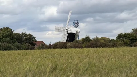 Windmill at Wicken Fen under Moving Clouds Video stock 315910923