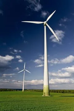 Windmills against a blue sky Stock Photos