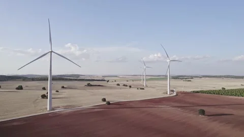 Windmills in agricultural fields Stock Footage 221766847