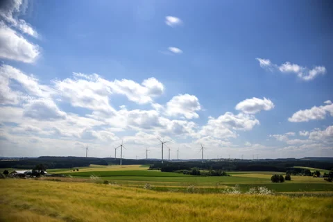 Windmills and fields 4K Stock Footage 238034101