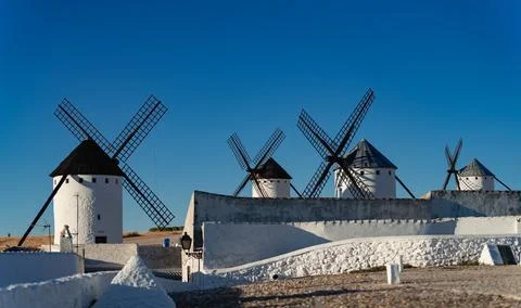 Windmills array under clear blue sky for text Stock-Fotos