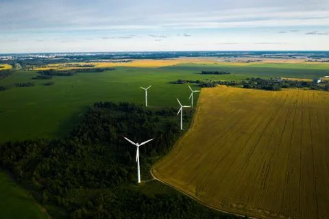 Windmills on the background of forests and fields. Windmill in nature.Belarus Fotos Stock
