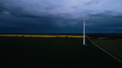 Windmills. Beautiful landscape with windmills.  Thunder clouds with lightning. Stock Footage 233116998