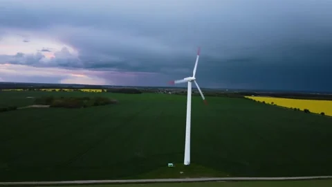Windmills. Beautiful landscape with windmills.  Thunder clouds with lightning. Stock Footage 233117000