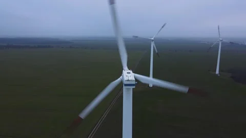 Windmills from a bird's eye view. Setting up windmills. Stock Footage 295069841