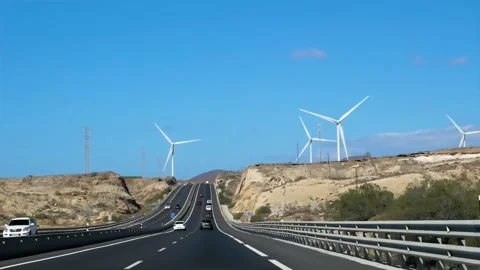 Windmills can be seen ahead. 스톡 동영상 230906953