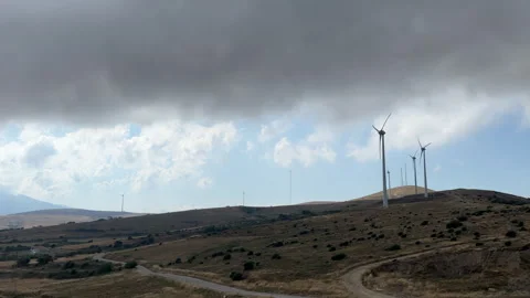 WINDMILLS WITH CLOUDY SKY Stock Footage 247889356