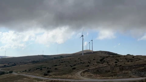 WINDMILLS WITH CLOUDY SKY Stock Footage 247889546