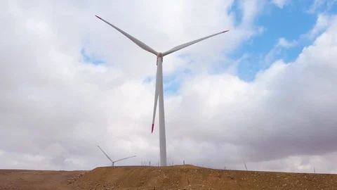 Windmills in the desert against the sky. Stock Footage 123601549