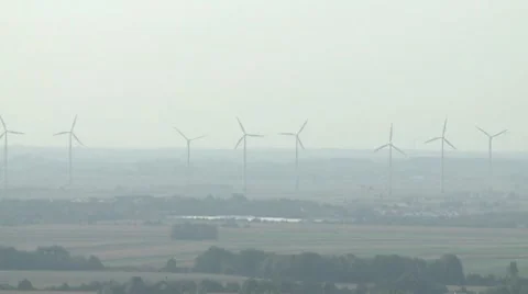 Windmills in the distance Stock Footage 8841259