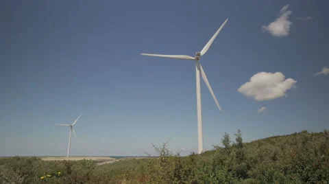 Windmills in the dunes Stock Footage 46997321