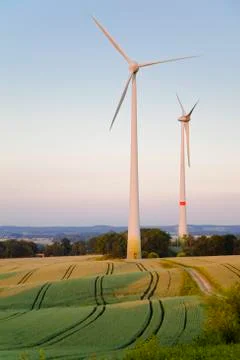 Windmills at dusk Stock Photos