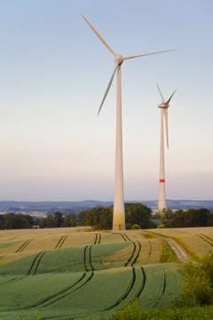Windmills at dusk Stock Photos