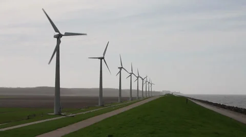 Windmills on dutch Dike Stock Footage 39018119