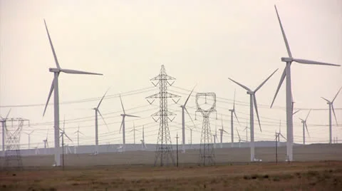 Windmills feeding the electrical grid with clean energy Stock Footage 22870392