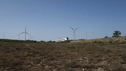Windmills in the field Stock Footage 77031959