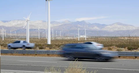 Windmills by the Freeway Stock Footage 121301230