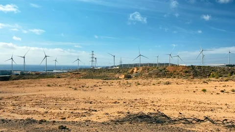 Windmills for generating electricity, rolling hills in the background. The Video stock 120977801