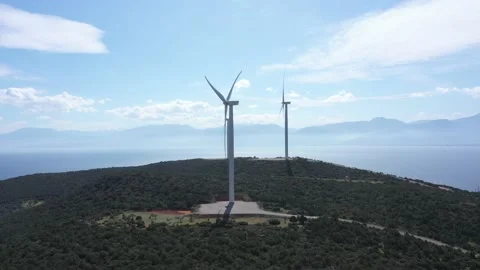 Windmills in Greece on a mountain overlooking the sea. Greece. Drone video 스톡 동영상 143916752
