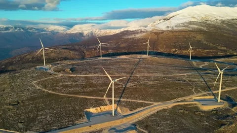 Windmills on the hills during sunset Stock Footage 232713825