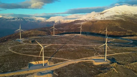 Windmills on the hills during sunset. Renewable energy, green energy Stock Footage 232625966