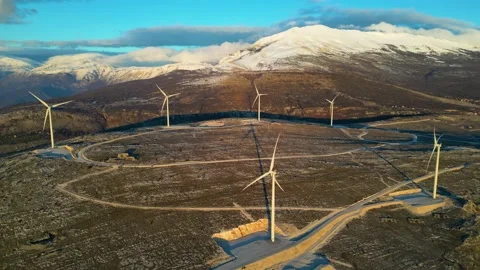 Windmills on the hills during sunset. Renewable energy, green energy Stock Footage 232802862