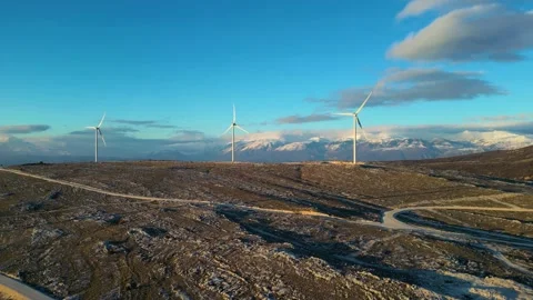 Windmills on the hills during sunset. Renewable energy, green energy Stock Footage 239754905