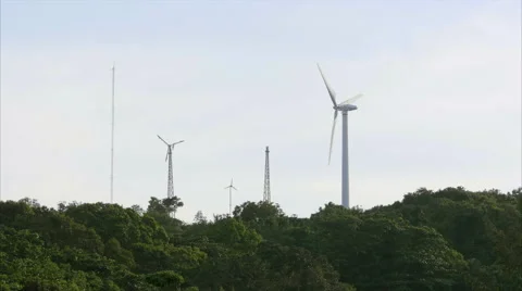 Windmills on a Hilltop with forest Video stock 58399338