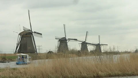 Windmills at Kinderdijk with boat Stock Footage 86754528