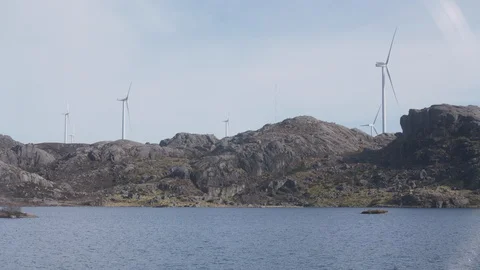 Windmills by the lake Stock Footage 127925160