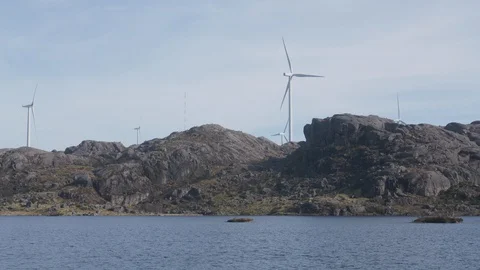 Windmills by the lake Stock Footage 127926739