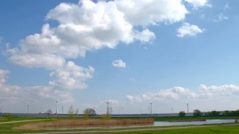 Windmills in landscape pan Stock Footage 108657695