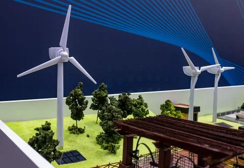Windmills on the layout of a small wind farm. Stock Photos
