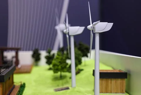 Windmills on the layout of a small wind farm. Stock Photos