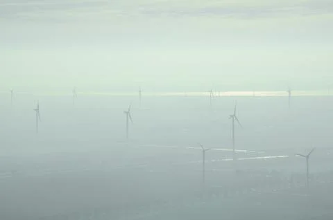 Windmills in the mist Foto stock