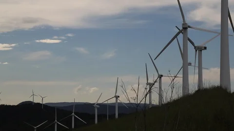 Windmills on a mountain top Stock Footage 123979678