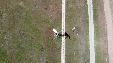 Windmills near the empty road Stock Footage 111078356