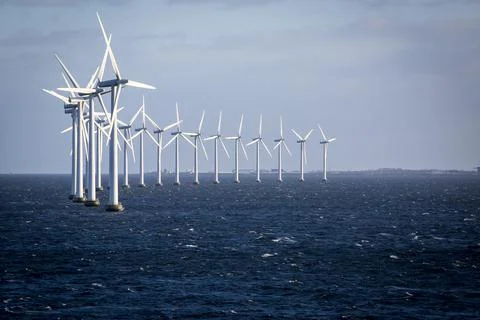 Windmills in the ocean Stock Photos