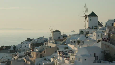 Windmills in Oia, Santorini, Greece Stockbeeldmateriaal 220242579