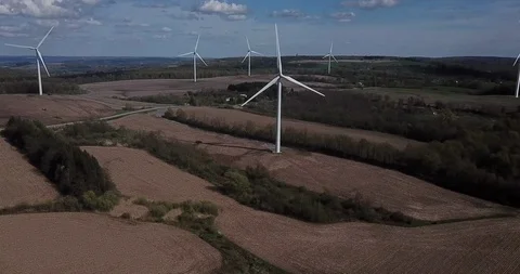 Windmills Pan Sideways and Lowering Stock Footage 109075179