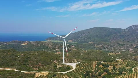 Windmills producing renewable energy from wind Видео 251632168